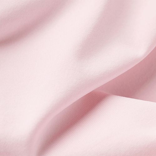 Close-up of pink Coolasun fabric with soft waves and folds