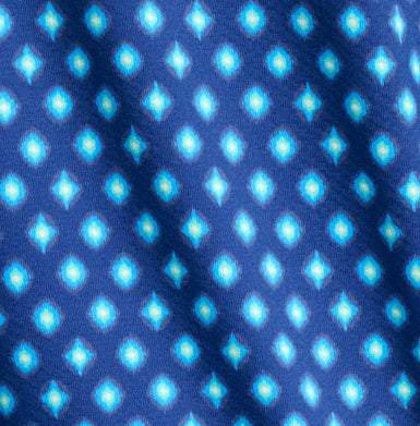 Pattern of blue diamonds on a dark blue background